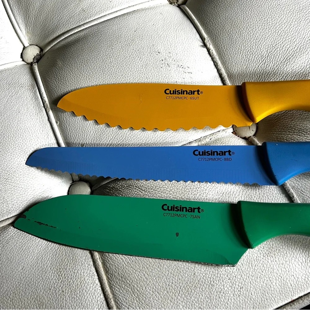 Cuisinart set of 3 knives with sleeves good condition